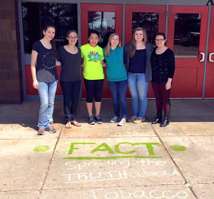 Factivism students spreading the truth through chalk art